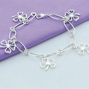 Silver Charm Bracelet with Clover Designs